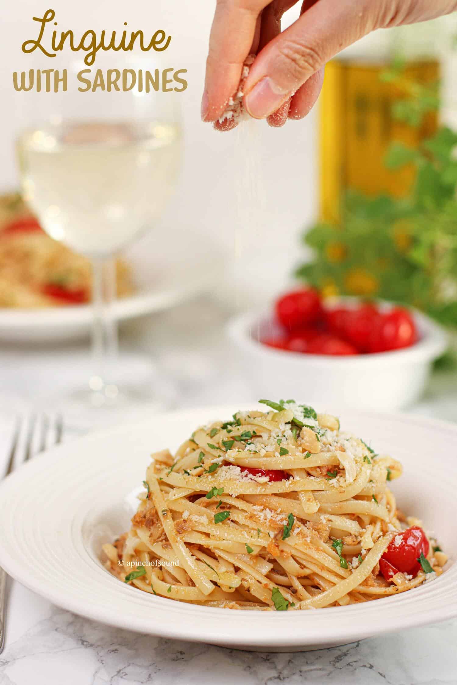 linguine pasta with sardines, tomatoes, peanuts, bread crumbs and parsley