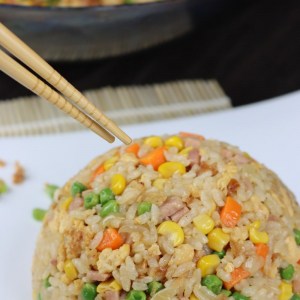 cantonese fried rice with eggs, corn, peas, carrots, ham.