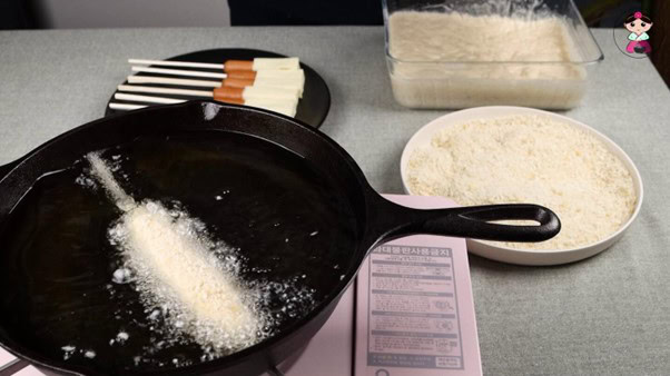 frying corn dogs.
