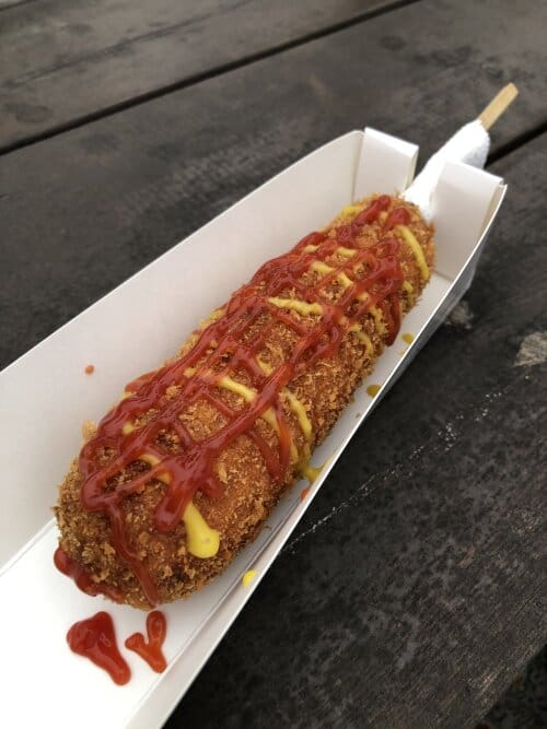 photo of a corn dog bought at photo showing inside the corn dog shop at the corn dog shop near Haedong Yonggungsa.