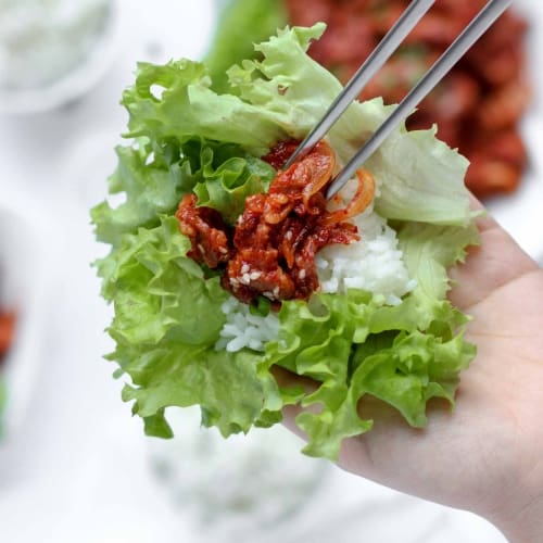 korean pork butt marinated in a spicy sauce made with gochugaru, jam, soy sauce, fish sauce, sugar.