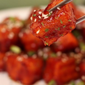 crunchy pan fried tofu is coated with an incredible sweet and tangy sticky glaze. Soft inside and cripsy on the outside.