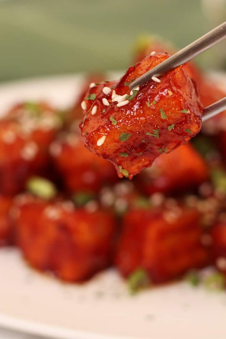 crunchy pan fried tofu is coated with an incredible sweet and tangy sticky glaze. Soft inside and cripsy on the outside