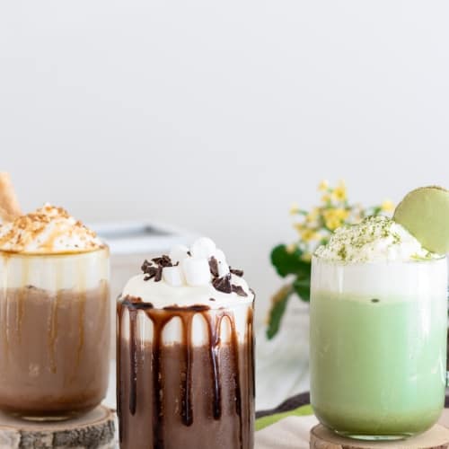 frozen hot chocolate 3 ways on a table.