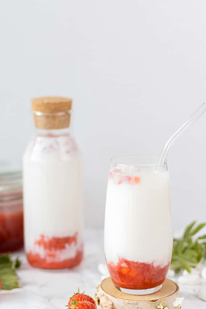 korean strawberry milk cafe style, strawberry puree mixed with milk and chunks of strawberries