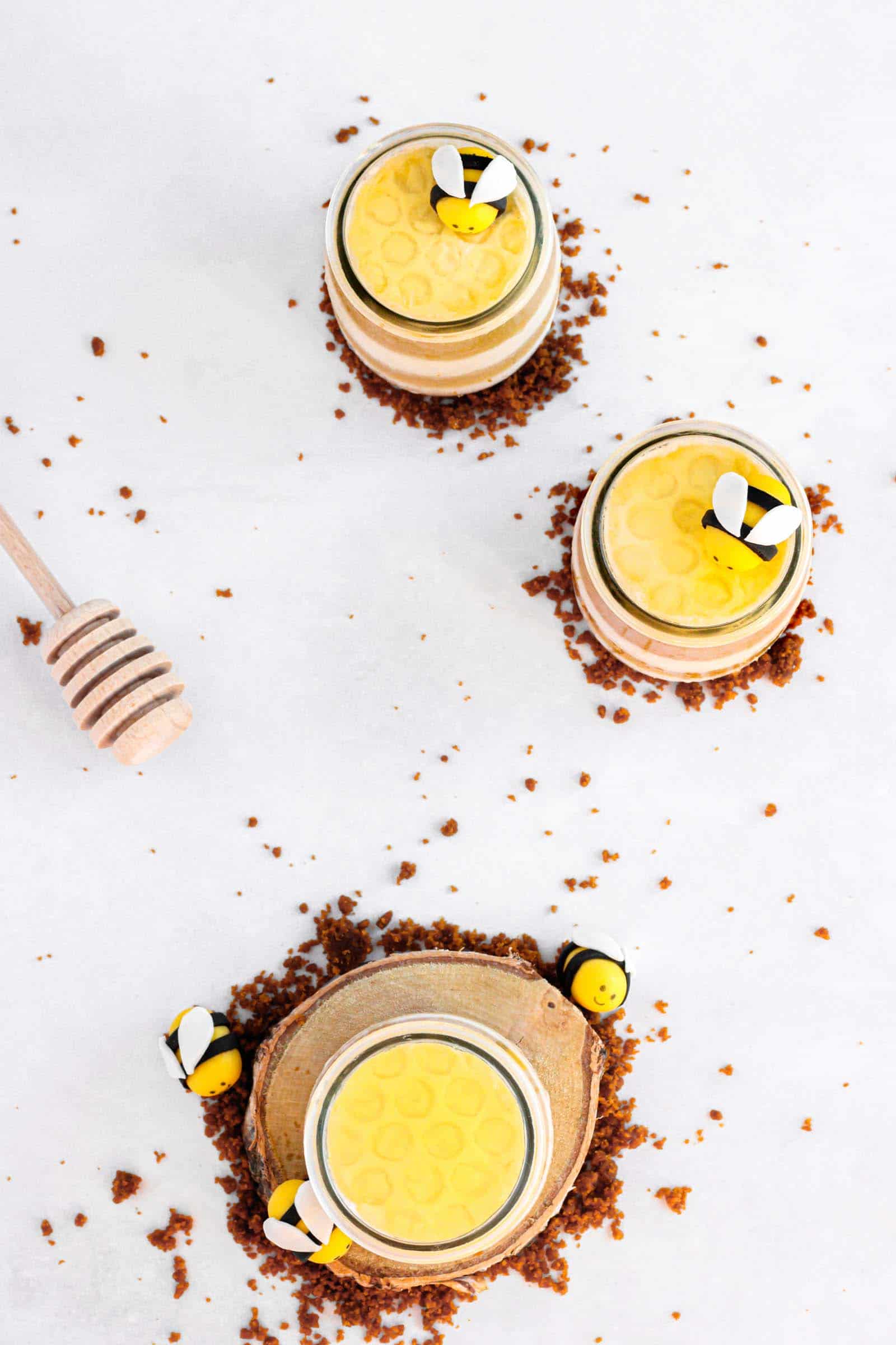 honeycomb-shaped coconut pineapple cheesecakes made with layers of coconut cheesecake and pineapple juice jelly