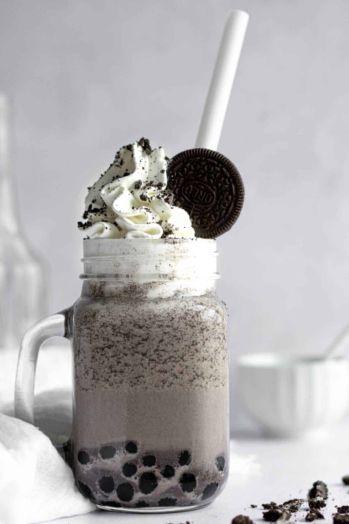 Oreo bubble shake made with tapioca pearls, vanilla ice cream, milk and crushed ice and Oreo cookies