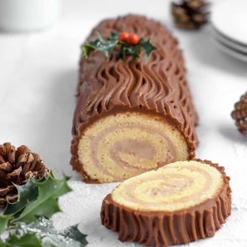 yule log cake with Grand Marnier filled with chestnut cream and chocolate.