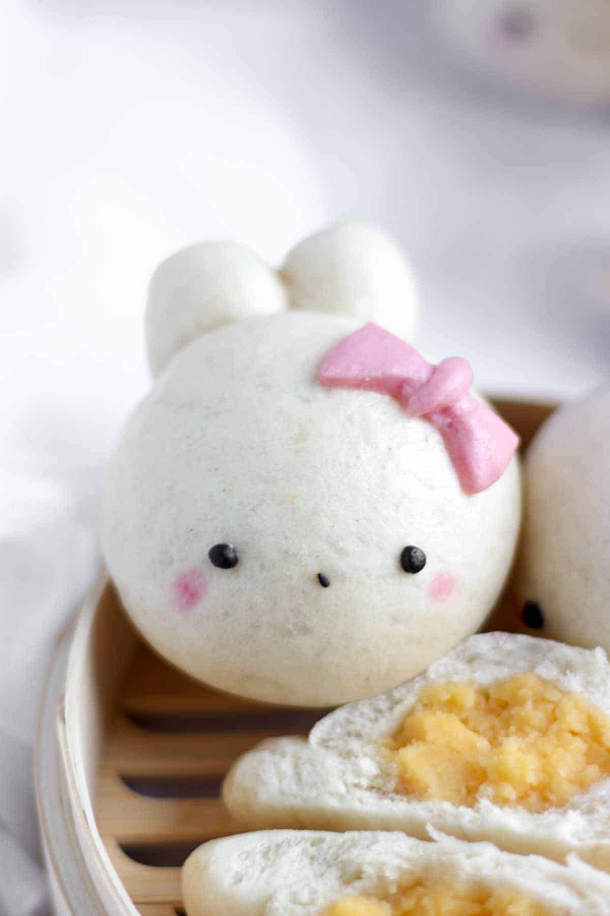 Chinese steamed bun filled with custard and shaped in a rabbit