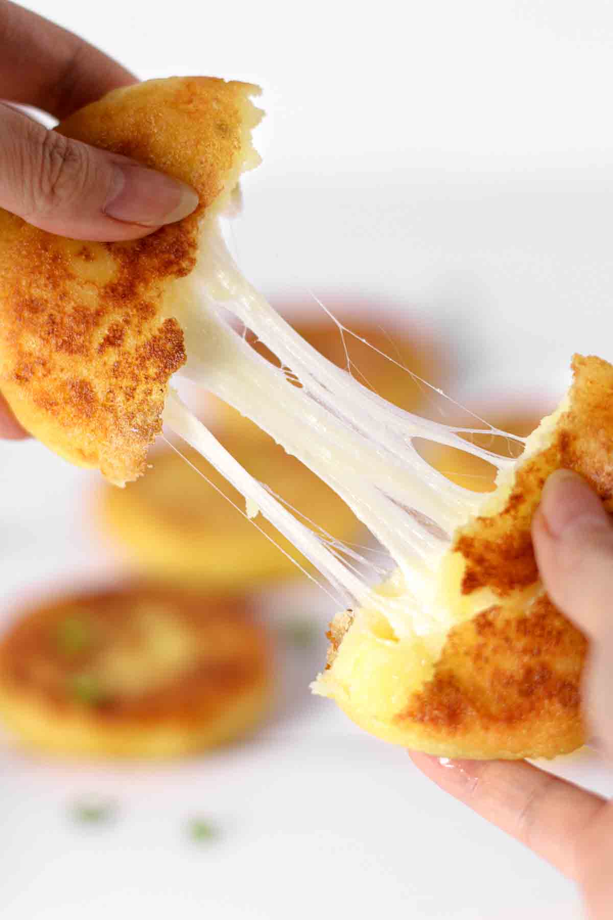 korean cheese potato pancakes, korean cheesy potato pancakes filled with cheese