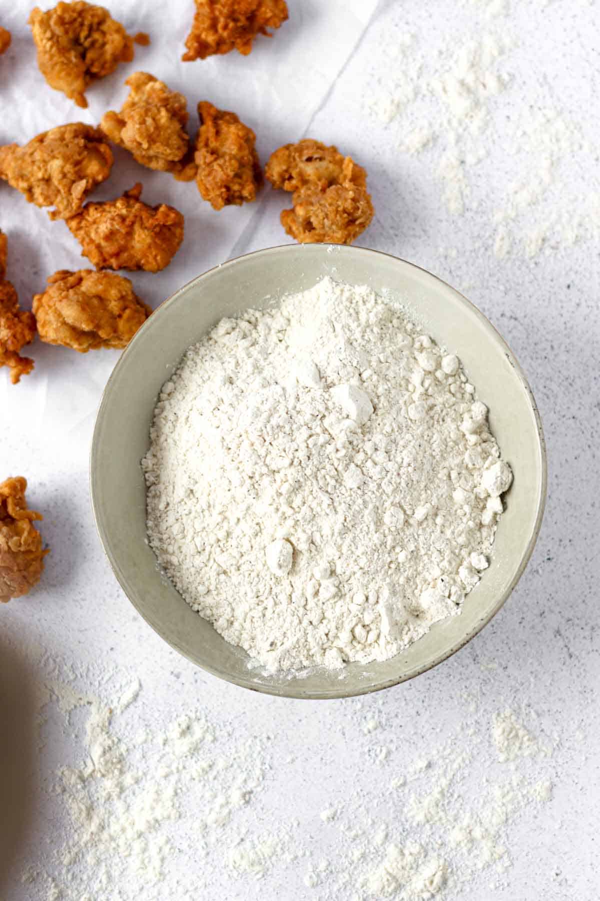 korean fried chicken frying mix in a white bowl
