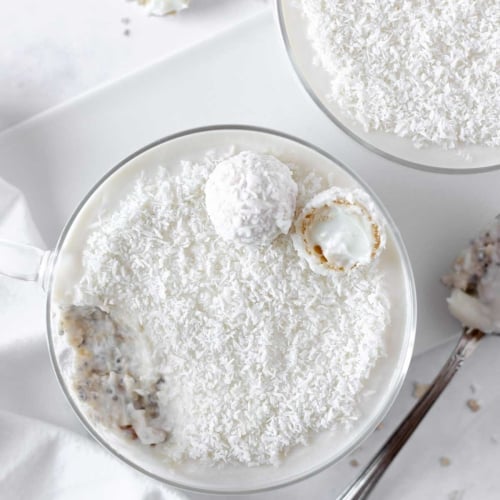 2 cups of Raffaello overnight oats on a table.