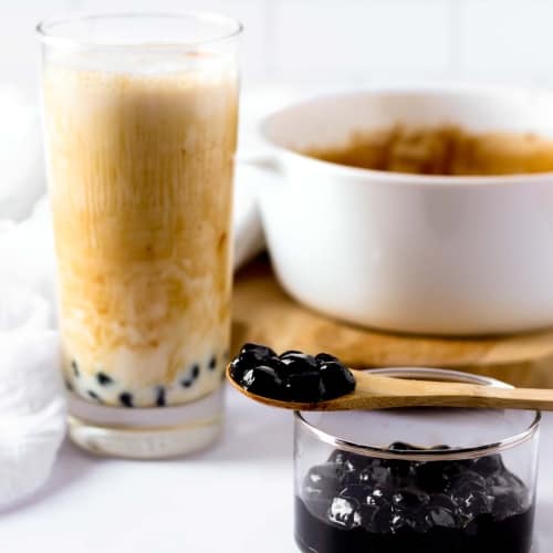 boba pearls with a glass of milk and boba pearls