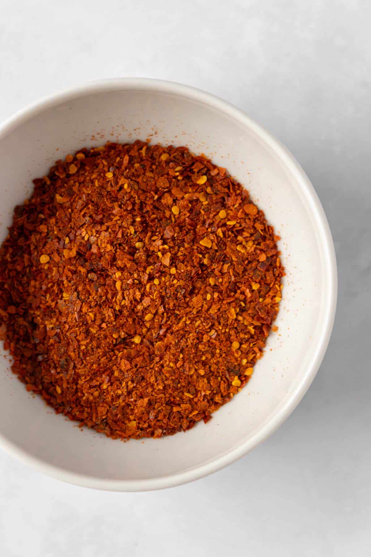 gochugaru Korean red pepper flakes in a small bowl.