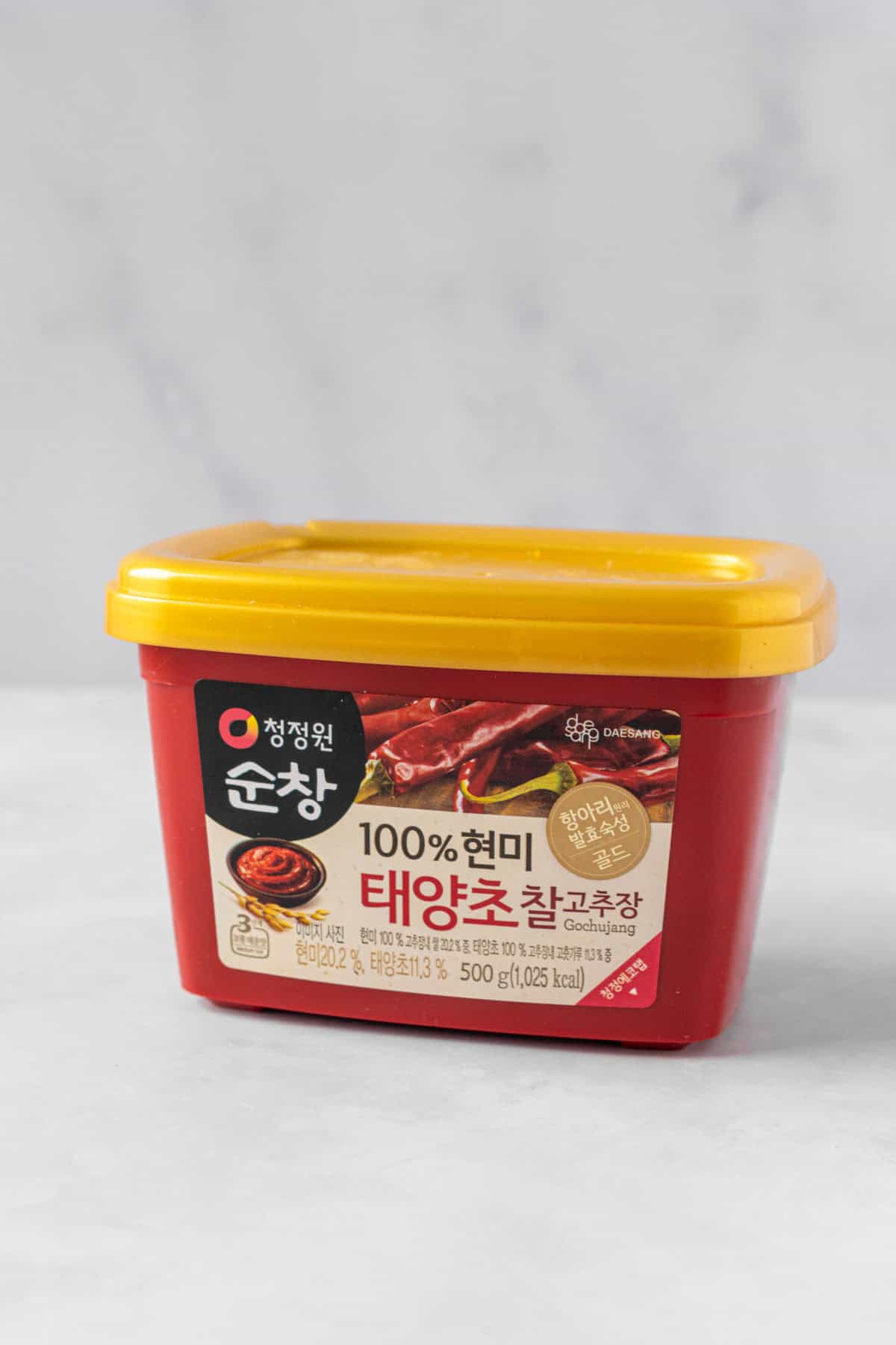 Red tub of Korean gochujang fermented chili paste.