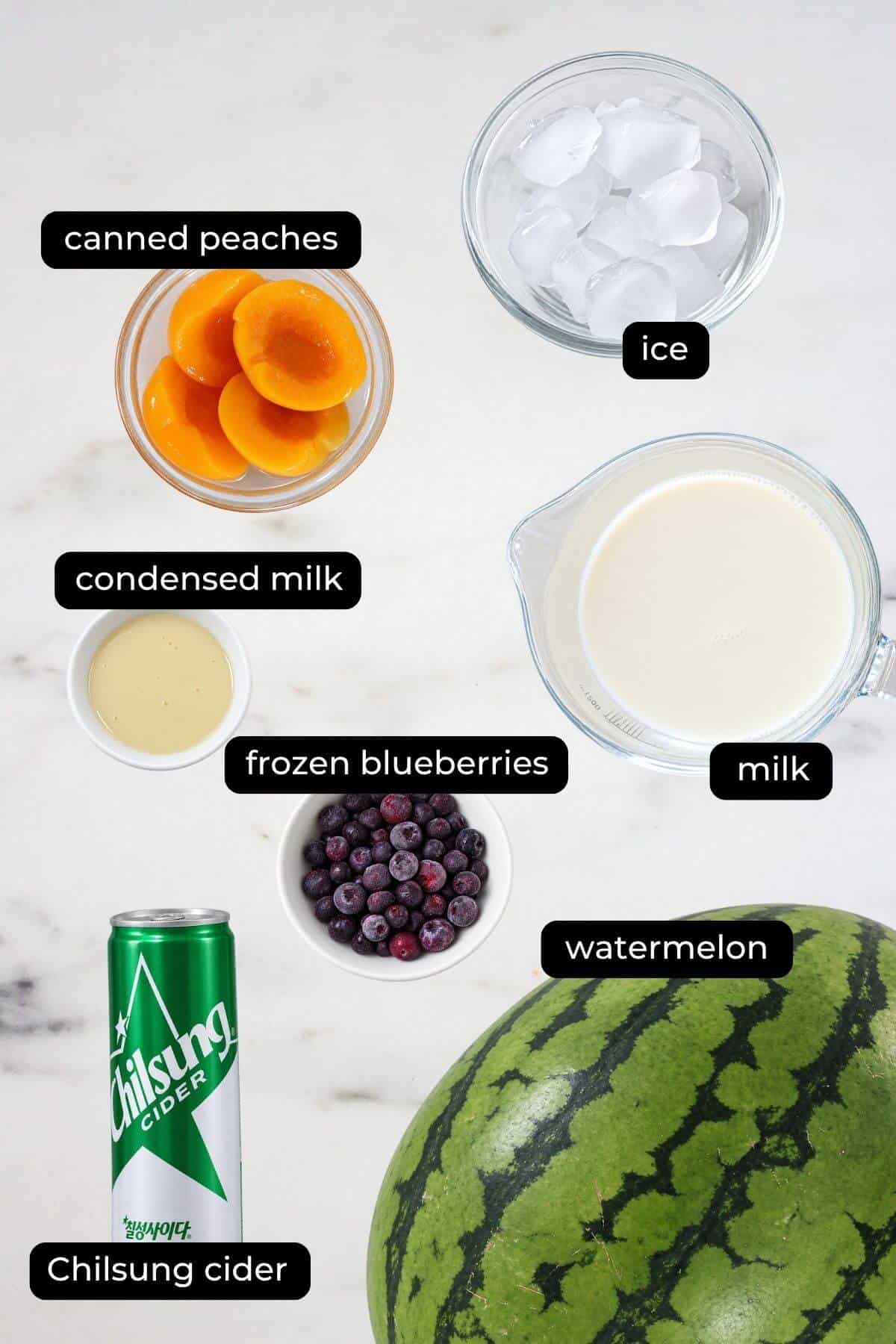 subak hwachae ingredients on a white marble table.
